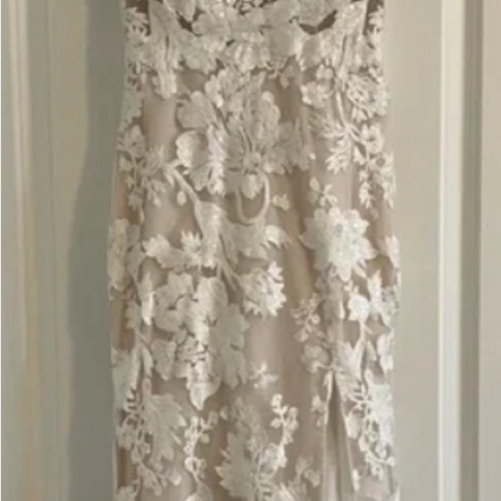 Wedding dress New without Tags No brand
Lace with sheath V-neck. Gorgeous! - Picture 7 of 10
